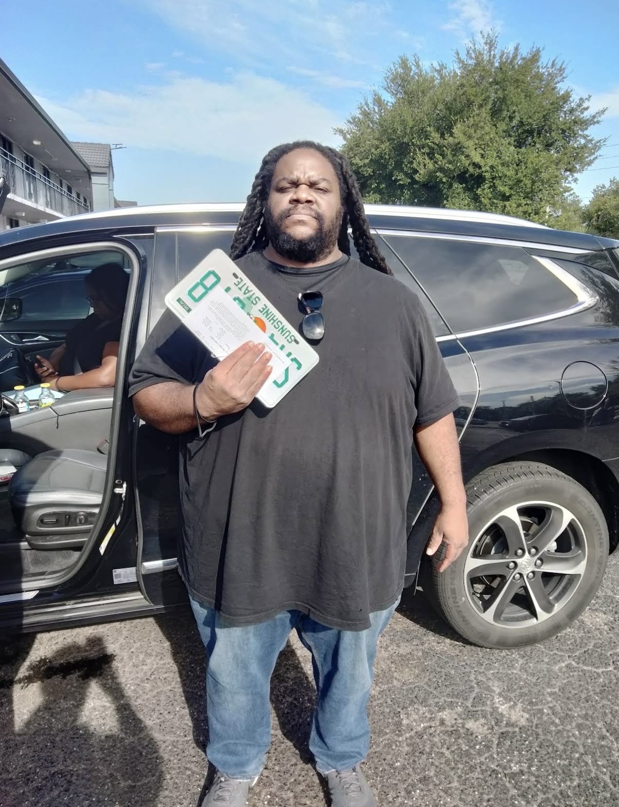 Fresh plate in hand and ready to hit the road.